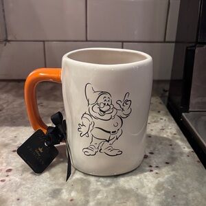 Rae Dunn White Ceramic Mug with Orange Handle and Cartoon Dwarf Graphic